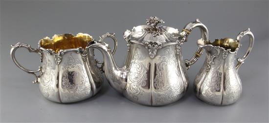 A Victorian three piece silver tea set by Henry Wilkinson & Co, gross 48 oz.